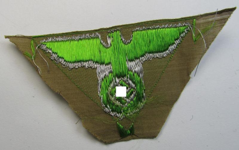 Neat, SA-related cap-eagle as was intended for the: 'Lagermütze' (ie. side-cap) being an example as woven in grass-green on a brownish-coloured background and as such intended for members within the: 'SA-Gruppe Nordmark o. Sachsen'