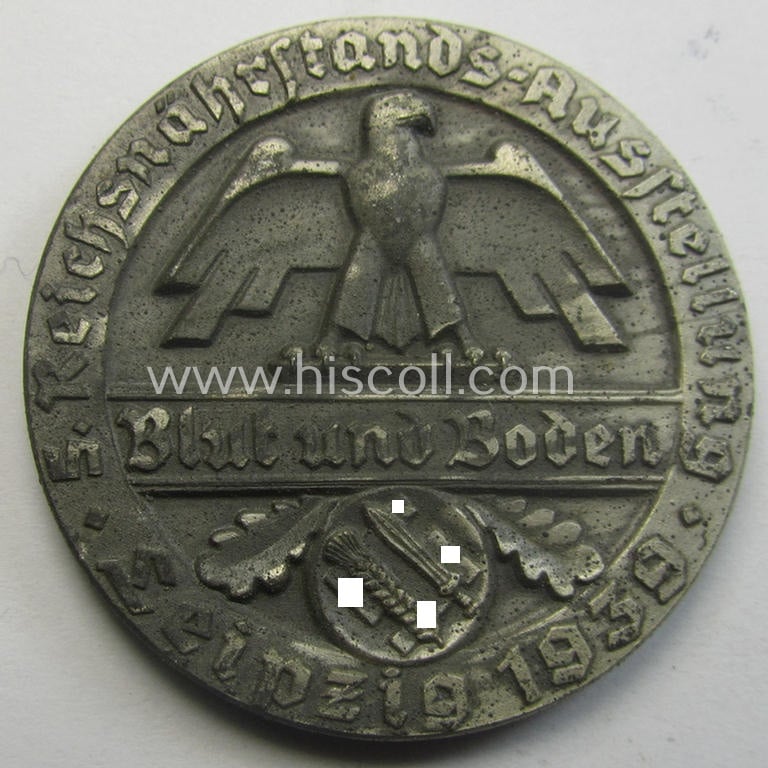 Greyish-silver-toned, 'Reichsnährstand'- (ie. 'RNSt.'-) related, commemorative-award-plaque entitled: '5. Reichsnährstands-Austellung - Blut und Boden - Leipzig 1939 - Frischbutter' and that comes stored in its period etui