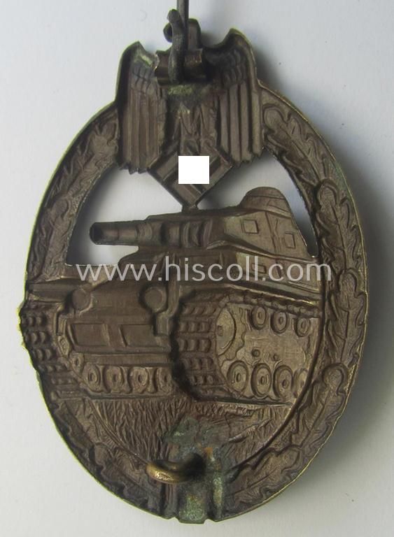 'Panzerkampf-Abzeichen in Bronze' being a (typical!) unmarked, 'Buntmetall'-based- and/or 'hollow-back'-specimen as was produced by the: 'Karl Würster'-company