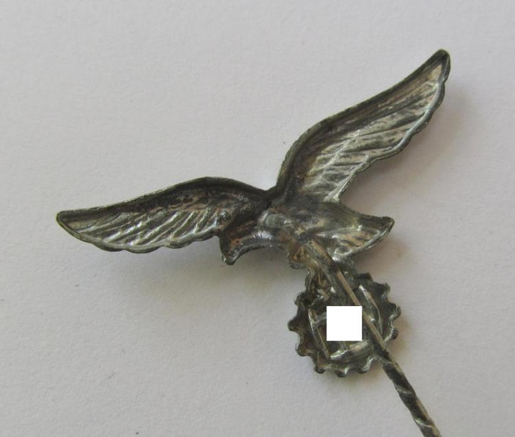Attractive - and actually scarcely encountered! - so-called: Lufwaffe- (ie. 'Heimat- u. Alarmflak-Artillerie'-) related, silver-toned membership-badge (ie. 'Mitglieds-Zivilabzeichen') that comes mounted onto its long-sized pin