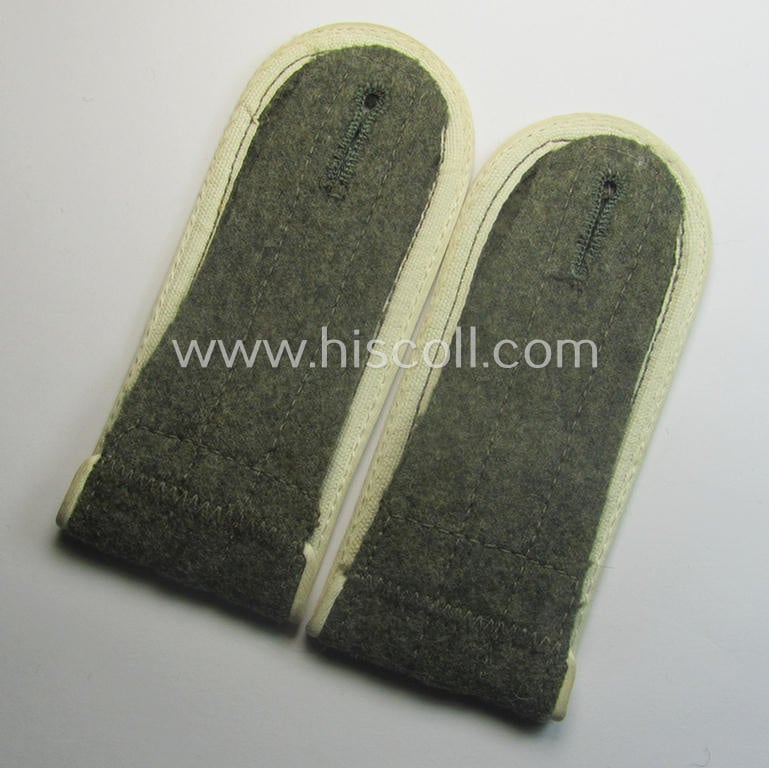 Pair of later-war-period, so-called: 'M44'-pattern, 'simplified' WH (Heeres) EM-type shoulderstraps: 'Soldat der Infanterie-Trpn.'