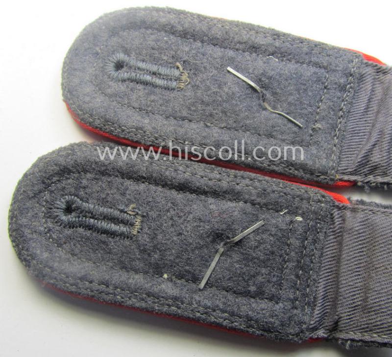 Pair of WH (Luftwaffe) NCO-type shoulderstraps as piped in the bright-red branchcolour as was intended for a: 'Feldwebel o. Wachtmeister der Flak-Artillerie-Trpn.'