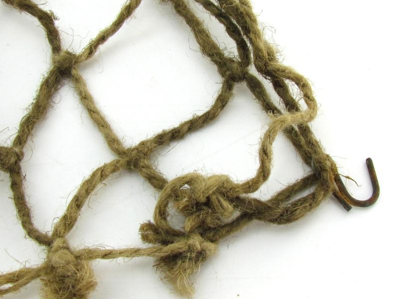 Complete late war German helmet net with attachment hooks
