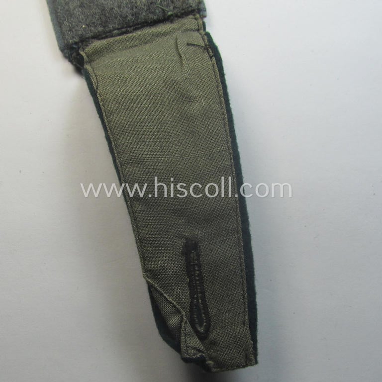 Single, WH (Heeres) EM-type 'cyphered' (ie. 'M40- o. M41'-pattern) shoulderstrap: 'Unteroffizier des Nachschub-Abtlgs. 6'