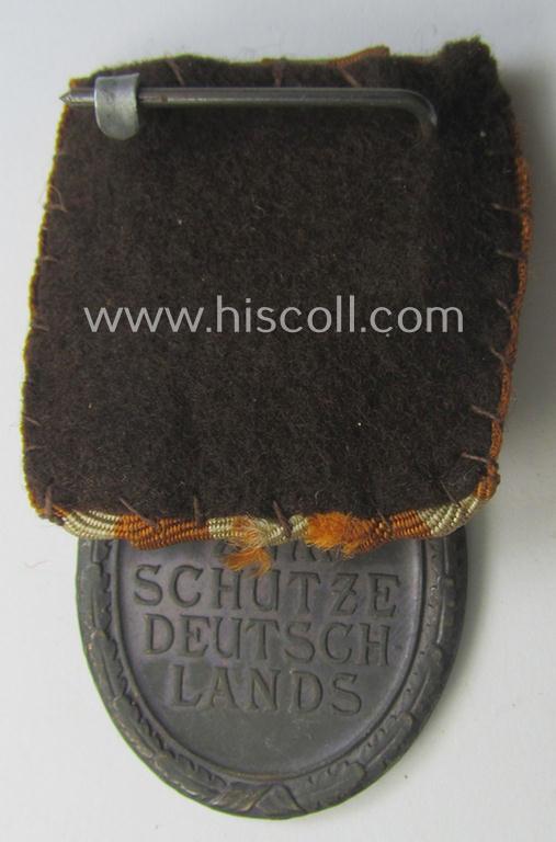 Single-pieced, non-detachable WH medal-bar (ie. 'Orden- o. Einzelspange') showing a: 'Deutsches Schutzwall Ehrenzeichen' (aka: 'Westwall'-medal)