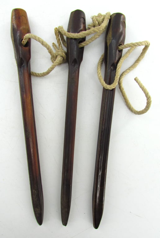 Matching set of 3 Bakelite tent pegs