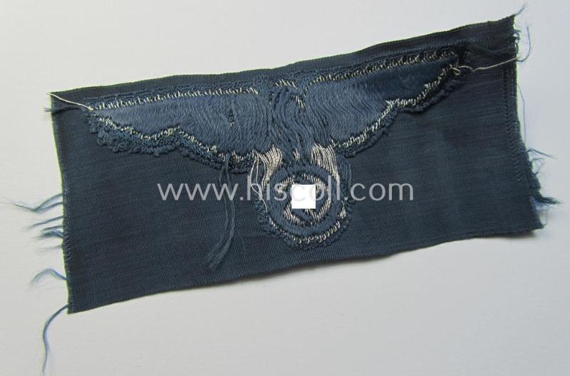 Superb, BZP (ie. 'Bahnschutz-Polizei') officers'-/ie. NCO-type side-cap- (ie. 'Schiffchen'-) eagle as woven in 'flat-wire-BeVo'-style and executed in bright-silver thread on a greyish-blue-coloured and linnen-based background