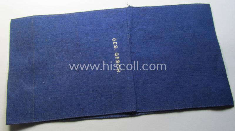 Attractive, darker-blue-coloured so-called: RLB (or: 'Reichsluftschutzbund') 'Amtsträger'-armband depicting the typical 'RLB'-logo (with lettering) and showing an interwoven 'Ges.Gesch.'-patent-pending-designation