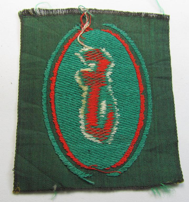 Attractive, 'Sicherheits- u. Hilfsdienst (SHD)' armbadge (ie. 'Ärmelabzeichen') as executed in 'BeVo'-weave pattern, as was intended for an SHD-member who served within the: 'Feuerlöschdienst' (or: fire-extinction-service)