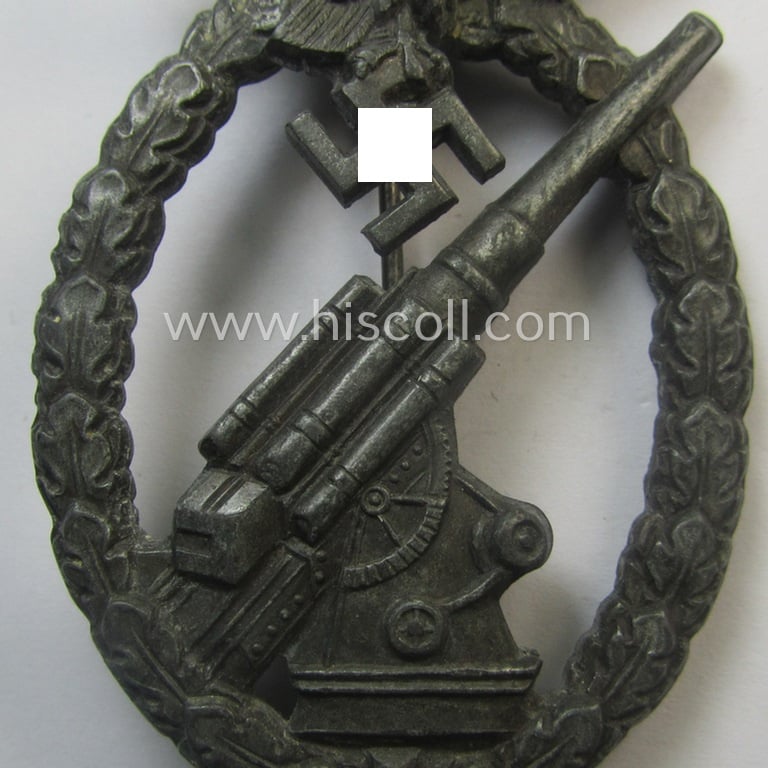 Later-war period- and/or: zinc- (ie. 'Feinzink'-) based- example of a maker- (ie. 'WH'-) marked, WH (Luftwaffe) 'Flakkampfabzeichen' (or: airforce anti-aircraft badge), as was produced by the desirable: 'Wilhelm Hobacher'-company