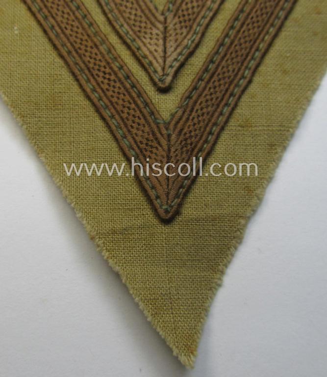 WH (Luftwaffe) tropical-styled, 'Armwinkel' (or: arm-chevron) as executed on typical beige- ie. tan-coloured linnen as was specifically intended for usage by a soldier with the rank of an: 'Obergefreiter'