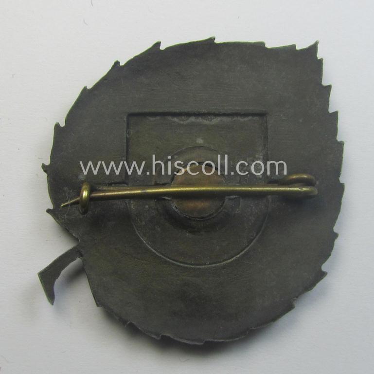 Truly used- and/or worn and/or typical 'Feinzink'-based cap-shield (ie. 'Mützenschild') entitled: 'Hrvatska-Legija 1941' as was intended for usage by a volunteer who served within the 'Deutsche Wehrmacht' ie. within the 'Kroatische Legion'