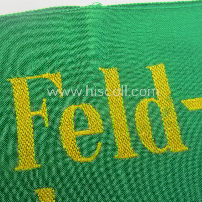 Wehrmacht-related, bright-green-coloured and/or linnen-based armband entitled: 'Feldgendarmerie' (as was specifically intended for usage by the staff of the notorious: 'Feldgendarmerie-Truppen')