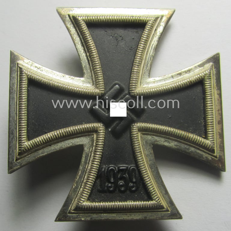 'Eisernes Kreuz 1. Klasse' (ie. Iron Cross 1st class) being a (typical) non-maker-marked example that was (I deem) produced by the desirable 'Hersteller' named: 'B.H. Mayer's Kunstprägeanstalt'