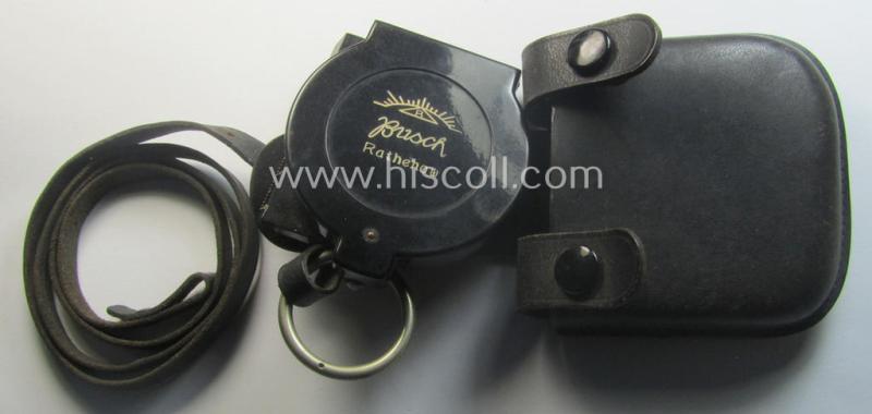 Pre-war-period, 'standard-issued'-pattern, black-coloured and resin-based WH compass (ie. 'Marschkompass') which is nicely maker- (ie. 'Busch - Rathenow'-) marked and that comes stored in its specific, leather-based etui