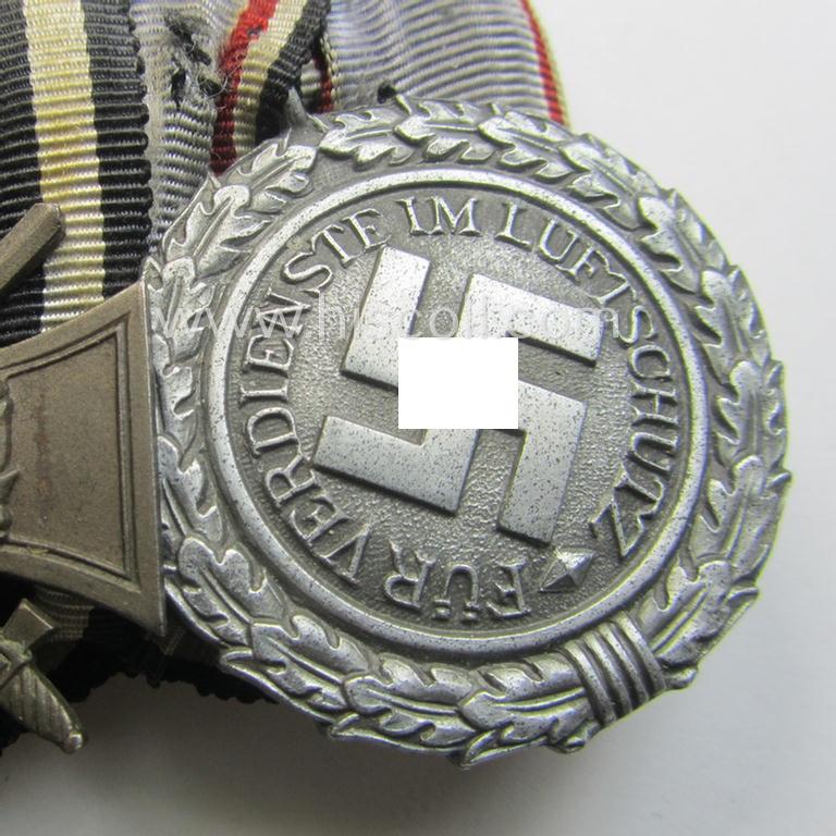 Unusually found, 3-pieced WWI- (ie. TR-) period medal-bar (ie. 'Ordenspange') respectively depicting a WWI-period: 'EKII.Kl.', a: Frontkämpferkreuz 1914-18' (ie.: 'Kriegsteilnehmerkreuz mit Schw.') and a: 'Luftschutz-Ehrenzeichen 2. Stufe'