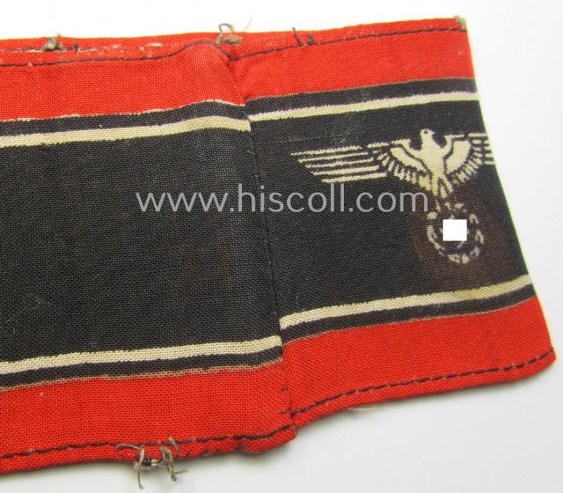 Superb, typically printed- and/or later-war-period, bright-red- and/or black-coloured so-called: 'Deutscher Volkssturm'-armband (ie. 'Armbinde') that comes in an overall very nice- (I deem truly used- and/or worn-), condition