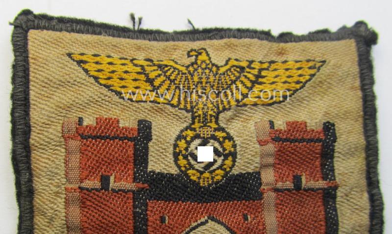 Superb - and only once before by me encountered! - multi-coloured N.S.D.A.P.-related arm-shield (or armband-device) showing the coat of arms of the town of München (ie. 'Hauptstadt der Bewegung')