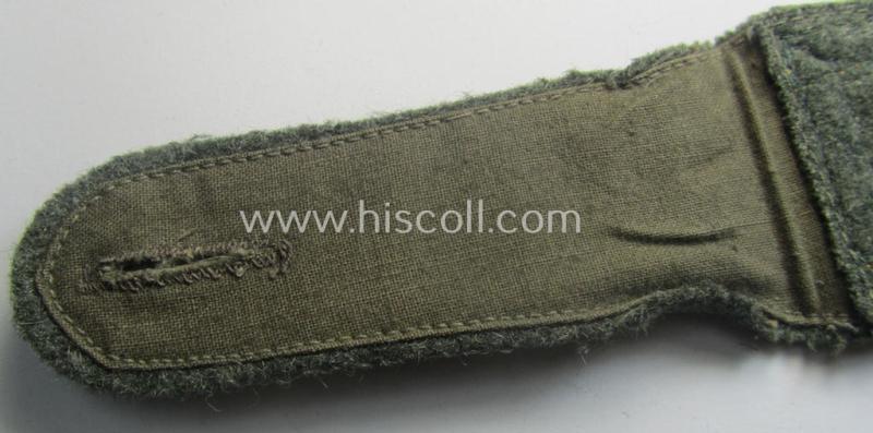 Single, 'cyphered'- (and I deem early- ie. mid-war-period) WH (Kriegsmarine) NCO-type shoulderstrap as was intended for usage by an: 'Unterfeldwebel eines Küsten-Artillerie-Rgts.'