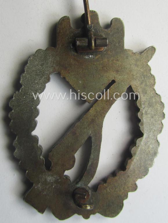 'Infanterie Sturmabzeichen in Bronze' (or bronze-class IAB) being a non-maker-marked, typical zinc- (ie. 'Feinzink'-) version ie. 'variant' as was (I deem) procuded by the: 'Funcke u. Brüninghaus'-company