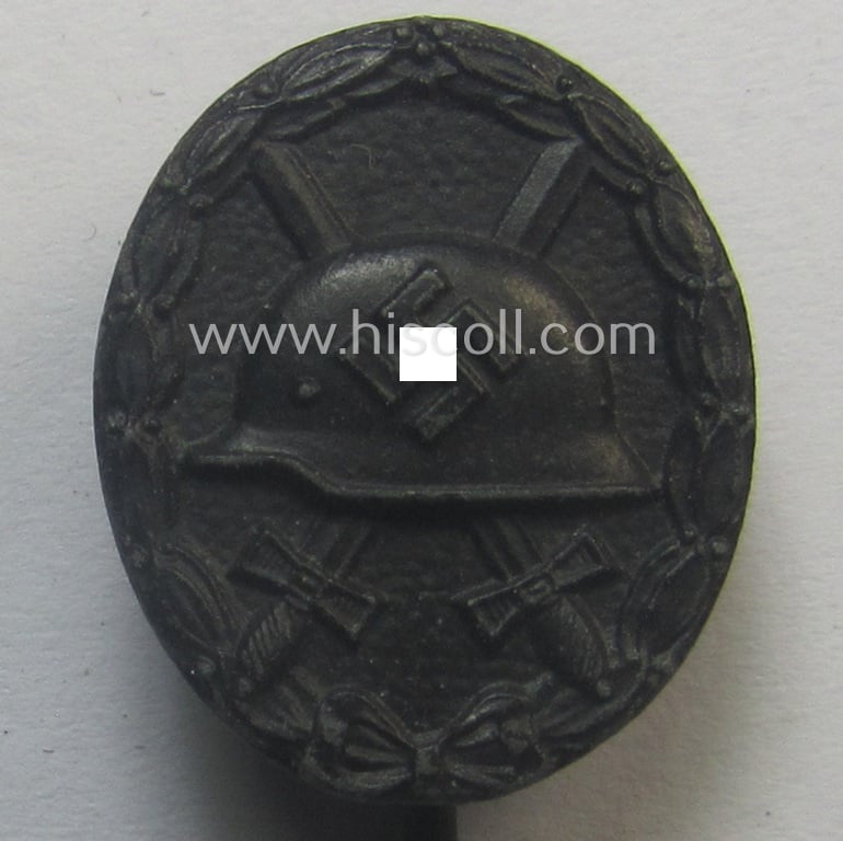 Neat - and 17 mm. sized! - miniature lapel-pin (ie. 'Halbminiatur') depicting a: 'Verwundeten-Abzeichen in Schwarz' (or: black-class wound-badge) being a maker- (ie. 'L/...?'-) marked example