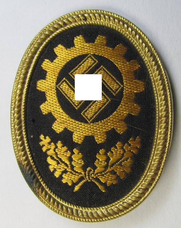 Yellowish-golden-toned- and/or partly machine-embroidered- (ie. 'BeVo'-woven-) so-called: 'DAF' (ie. 'Deutsche Arbeitsfront') cap-badge being an example that is neatly 'RzM 374'-marked on its back