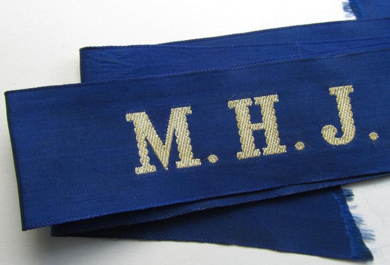Superb - and with certainty very rarely encountered! - Marine-HJ (ie. 'Marine-Hitlerjugend') cap-tally (ie. 'Mützenband') entitled: 'M.H.J. Krefeld' (being a full-length example that comes in an overall nice condition)