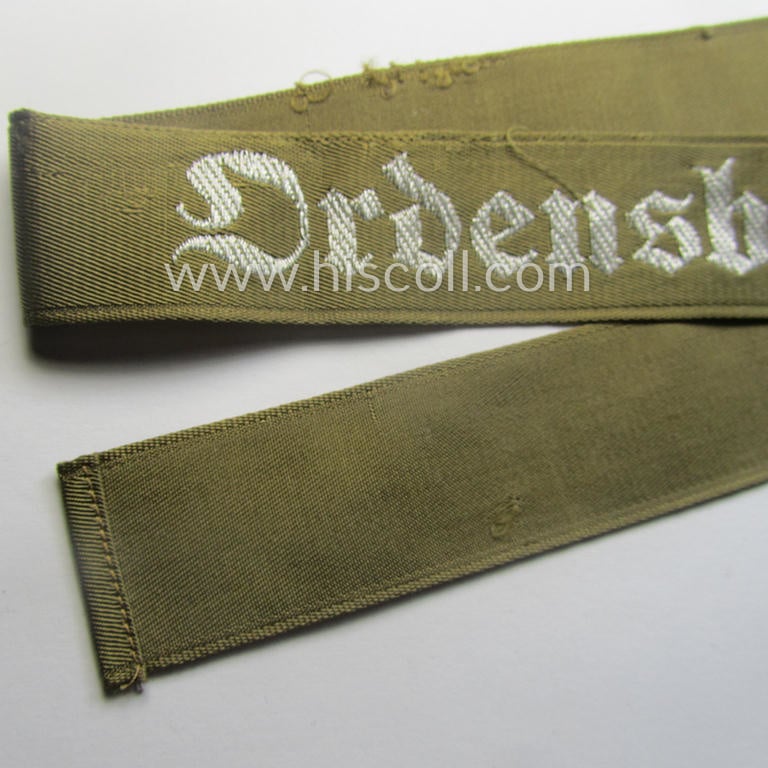 Superb - full length and 'flat-wire'-woven! - 'N.S.D.A.P.'- (ie. 'Politische Leiter'-) related cuff-title (ie. 'Ärmelstreifen') entitled: 'Ordensburgen' (being a 'virtually mint- ie. unissued' example that still retains its 'RzM'-etiket)