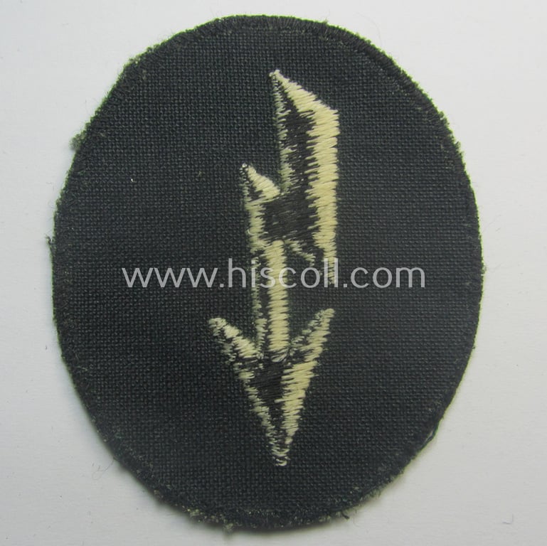 Thin-shaped- ie. 'variant'-pattern, WH (Heeres) trade- and/or special-career insignia ie. machine-embroidered signal-blitz (being a non-maker-marked example as executed in white) as intended for the: 'Infanterie-Trpn.'