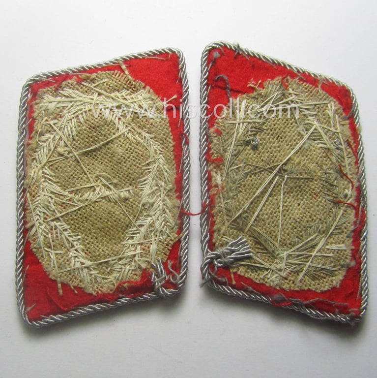 Truly used- and/or worn, 4-pieced WH (LW) insignia-set comprising of a pair of hand-embroidered, WH (Luftwaffe) officers'-type collar-patches and dito shoulderboards: 'Major der Flak-Artillerie-Trpn.'