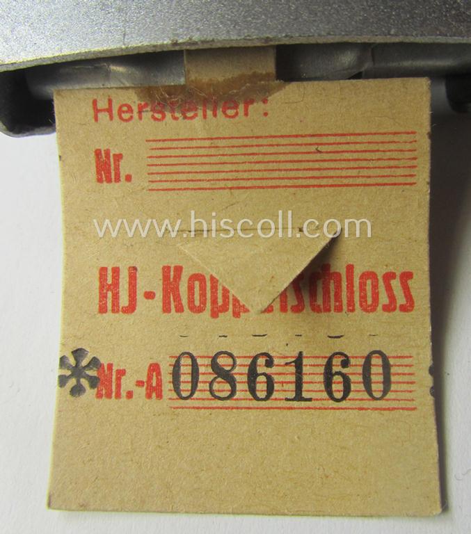 'Virtually mint' - and actually very scarcely encountered! - 'HJ- o. Hitlerjugend'-belt-buckle being a clearly maker- (ie. 'RzM M4/24'- ie. 'FLL') marked example that comes with its period-attached makers'-etiket
