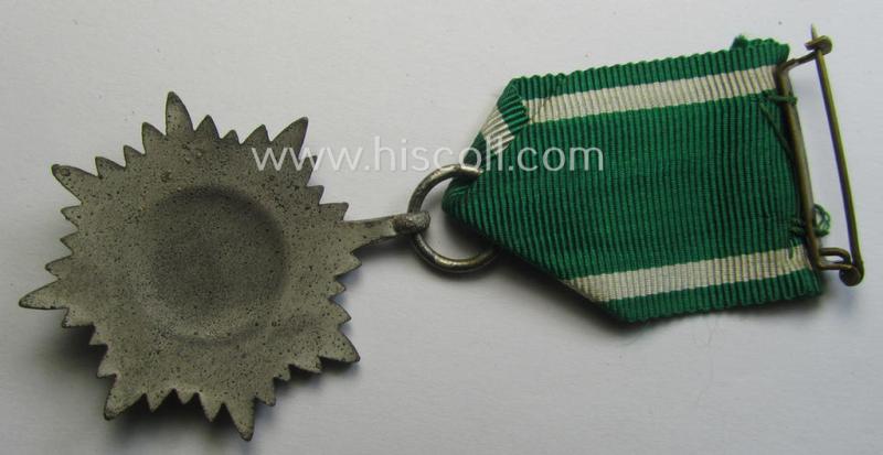 WH-related 'Tapferkeitsauszeichnung für Angehörige der Ostvölker, 2. Kl. in Silber mit Schwn.' (being a 'Feinzink'-based example that comes stored in its period pouch)