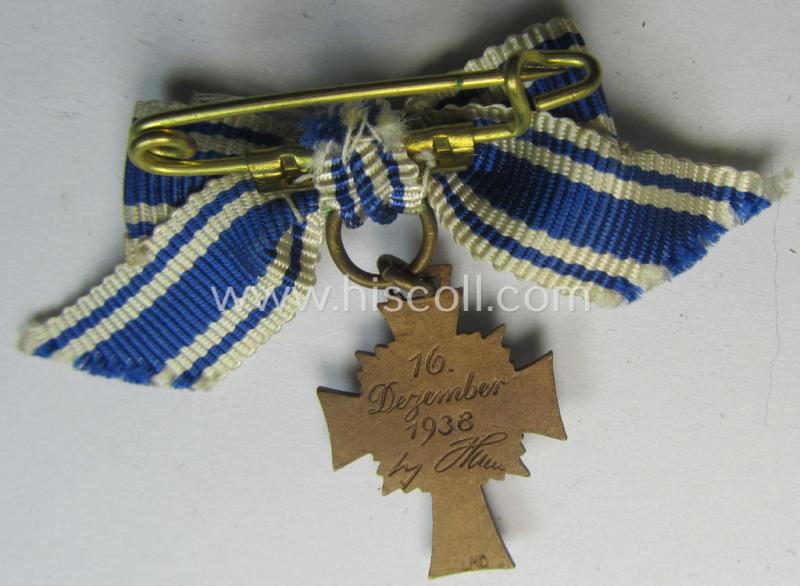 Miniature of an: 'Ehrenkreuz der deutschen Mutter - dritte Stufe' (or: bronze-class mothers'-cross) being a maker- (ie. 'L/10'- ie. 'Deschler'-) marked example that comes in an overall nice- (albeit moderately worn- ie. used-), condition
