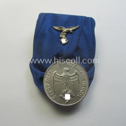 Bright silver-toned WH (Luftwaffe) so-called: 'Einzelspange' showing a:...