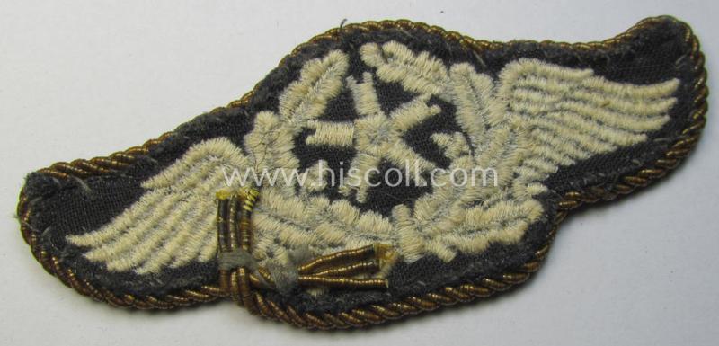 Attractive - and scarcely seen! - example of a WH (Luftwaffe) machine-embroidered, so-called: trade- ie. special-career-patch (ie. 'Tätigkeitsabzeichen') having a golden-yellow-coloured 'Goldkordel' attached as was intended for: 'Flugzeugpersona...