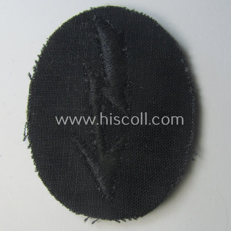 WH (Heeres) trade- and/or special-career-insignia (ie. machine-embroidered 'signal-blitz') example as executed in black-coloured linnen as was specifically intended for a soldier within the: 'Pionier-Trpn.'