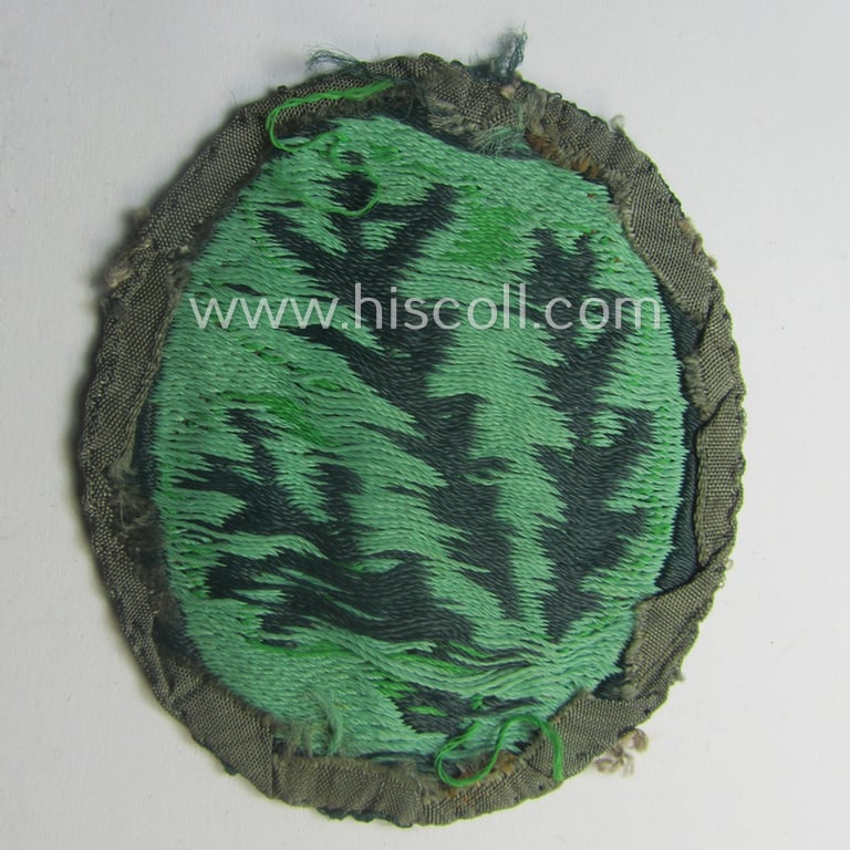 Truly used- and/or worn, WH (Heeres) EM- (ie. NCO-) type, so-called: 'Jäger'-armpatch being a (typical) 'BeVo'-woven example as was executed on field-grey-coloured linnen as was intended for usage by the: 'Jäger-Trpn.'