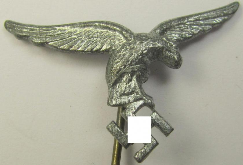 Greyish-silver-toned lapel-pin (ie. 'Zivilabzeichen') to be worn on the civil attire as was intended for usage by the various staff-members of the 'Luftwaffe' (depicting an early-pattern- ie. 'down-tailed'-eagle)