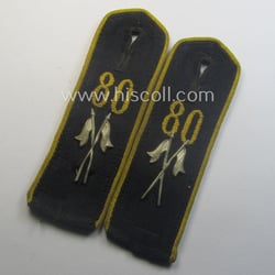 Pair of neatly 'cyphered', bright-yellow-piped, so-called: 'Nachrichten-HJ'- (ie....