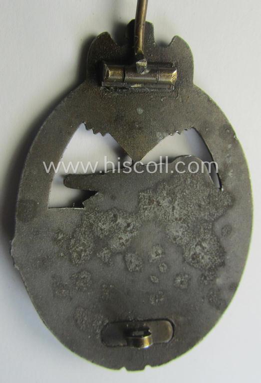 'Panzerkampfabz. in Bronze' (or: bronze-class panzer assault-badge or PAB) being a zinc- (ie. 'Feinzink'-) version (having a so-called: 'horizontal'-catch-set-up) as was procuced by the: 'Steinhauer u. Lück' (ie. 'S.& L.') company