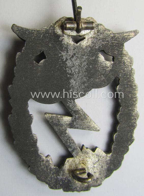 Mid- (ie. later-war-) period, zinc- (ie. 'Feinzink'-) based version of a WH (Luftwaffe) 'Erdkampfabzeichen' having a separate eagle-device attached and being a non-maker-marked example as was produced by the 'Gustav Brehmer'-company