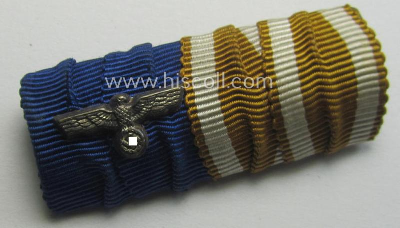 Attractive, 2-pieced WH (Heeres o. KM) medal-bar-set (ie. 'Orden- o. Doppelspange-Satz') showing resp. a: 'WH DA für 4 Jahre t.D.' and a: 'Deutsches Schutzwall Ehrenzeichen' (aka: 'Westwall'-medal)