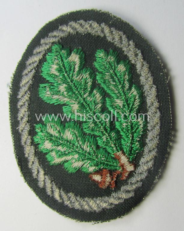 WH (Heeres) 'Jäger'-arm-badge being a desirable 'variant-pattern'-example as was executed in the machine-embroidered style on a thin-shaped- and/or linnen-based background