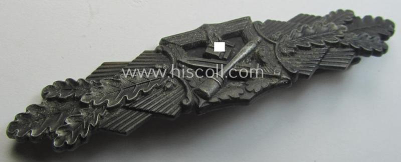 'Nahkampfspange in Bronze' (or: bronze-class close-combat clasp ie. CCC) being a (typical) non-maker-marked- and/or minimally converse-shaped specimen as was produced by the maker- (ie. 'Hersteller') 'Steinhauer & Lück'