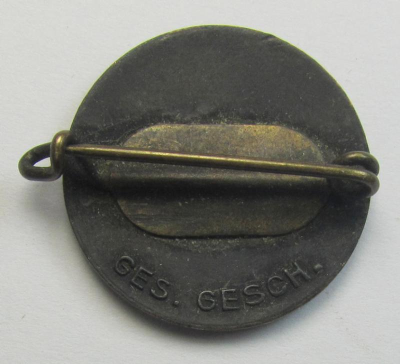 Attractive - darker-red-coloured and nicely preserved! - early-period, 'N.S.D.A.P.'-membership-pin- ie. party-badge (or: 'Parteiabzeichen') being a non-maker-marked example that is just bearing a: 'Ges.Gesch.'-patent-pending designation