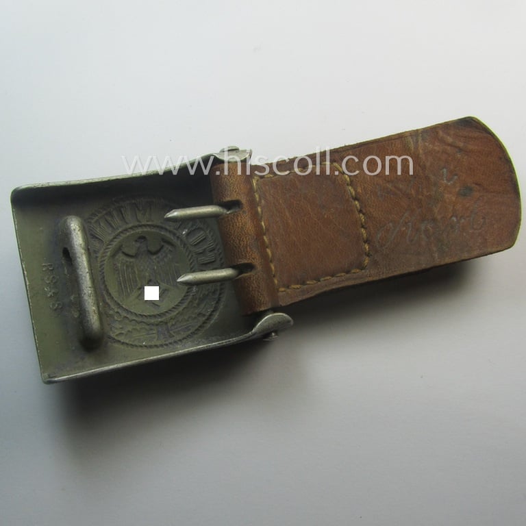 WH (Heeres) 'standard-pattern', field-grey-toned- and aluminium-based belt-buckle being a maker- (ie. 'R. Sieper & Söhne'-) marked- and/or: '1937'-dated example that comes mounted onto its leather-based tab