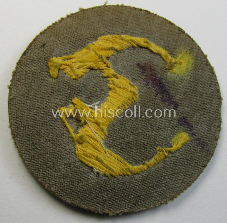 WH (Heeres) so-called: trade- and/or special-career arm-insignia (ie. 'Laufbahn- o. Tätigkeitsabzeichen') as was specifically intended for an army: 'Feuerwerker' (being a neatly hand-embroidered variant on field-grey-coloured wool)