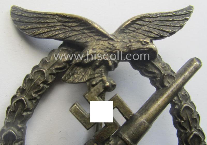 WH (Luftwaffe) 'Flakkampfabzeichen' being a detailed 'Buntmetall'-based and (unusually seen!) non-maker-marked example as was produced by the: 'C.E. Juncker'-company and that comes as moderately worn