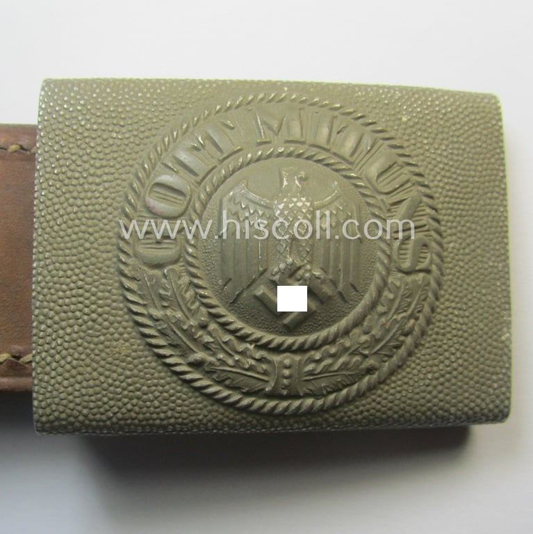 Superb, WH (Heeres) 'standard-pattern', field-grey-toned- and aluminium-based belt-buckle being a maker- (ie. 'Overhoff & Cie.'-) marked- and/or: '1938'-dated example that comes mounted onto its leather-based tab