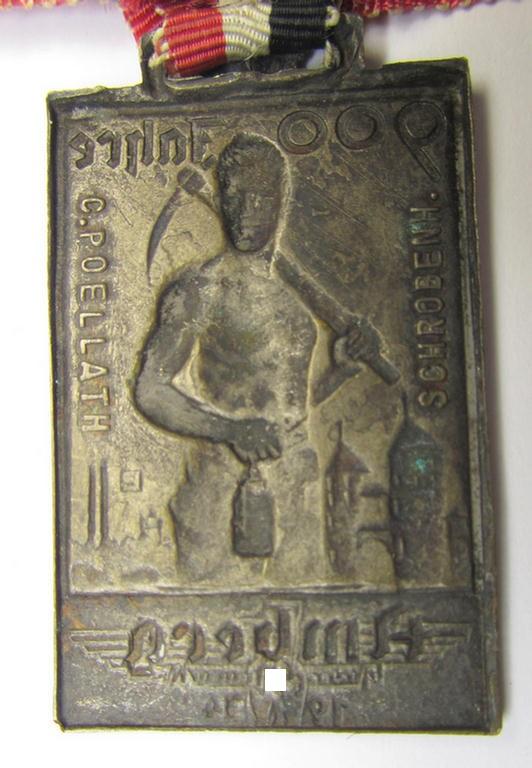 Commemorative, 'Buntmetall'-based 'Veranstaltungsabzeichen' (ie. 'tinnie') being a neatly maker- (ie. 'Carl Poellath'-) marked example that comes mounted on its ribbon showing the text: '900 Jahre Amberg - Bayr. Ostmark - 1934'